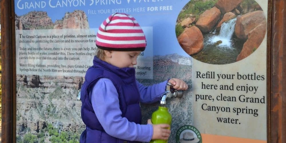 child refilling water bottle at grand canyon national park